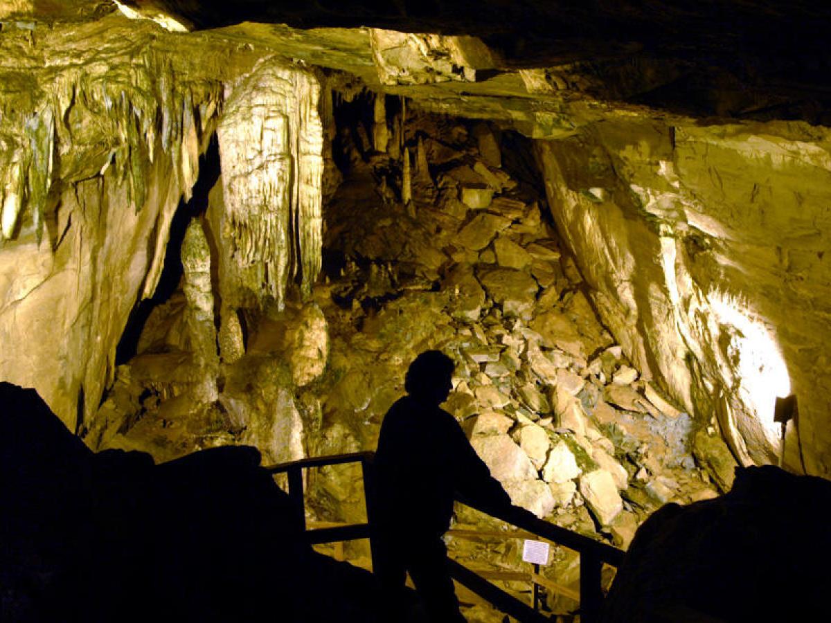Man overlooking cavern
