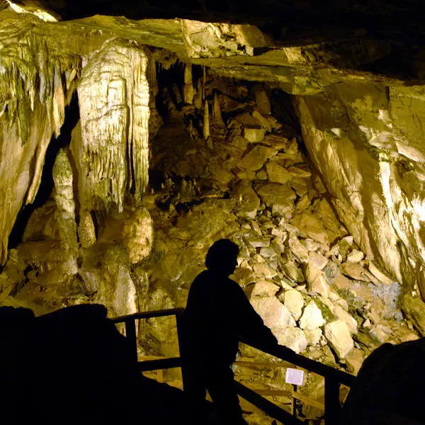 Man overlooking cavern