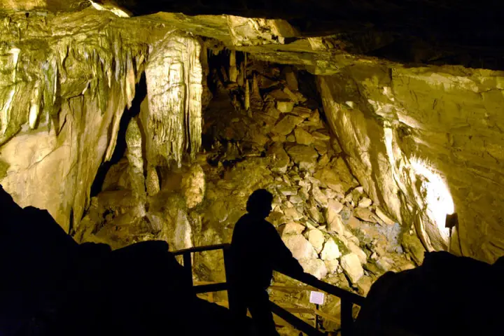 Man overlooking cavern